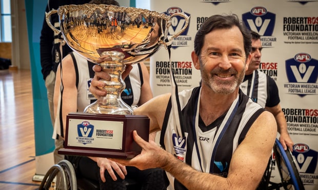0904_AMON_620.jpg Richard Amon celebrates with the premiership trophy after a nine-goal performance against Richmond in the Grand Final. Image: Nerissa Turner Photography. - Collingwood,Collingwood Magpies